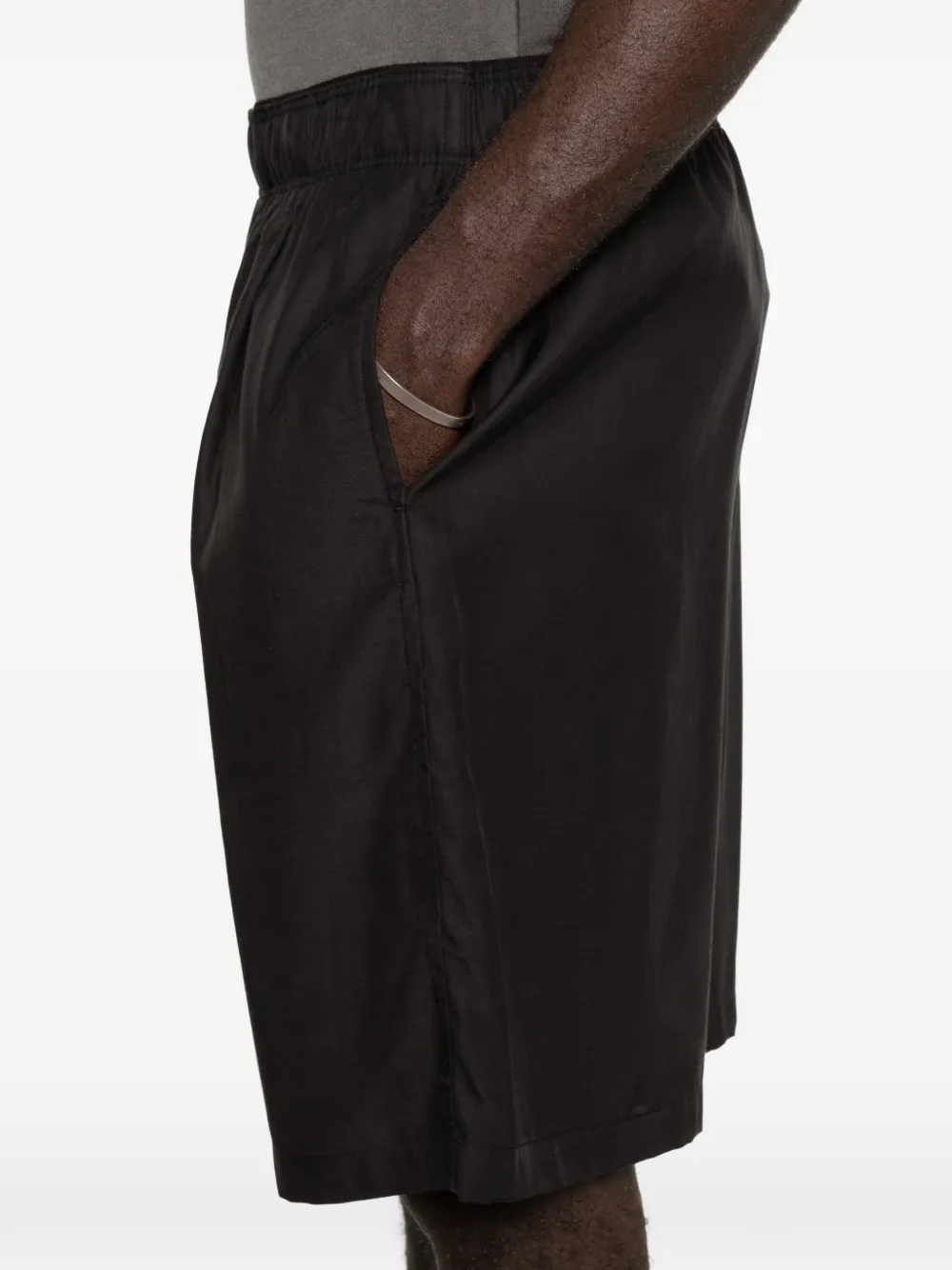 Close up of black shorts, showing texture of the Cupro and Cotton fabric