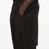 Close up of black shorts, showing texture of the Cupro and Cotton fabric