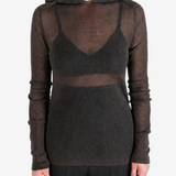 Brown top worn by a person, showing the top fit