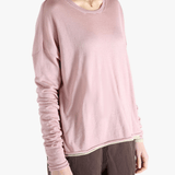 Pink top worn by a person, showing the top fit