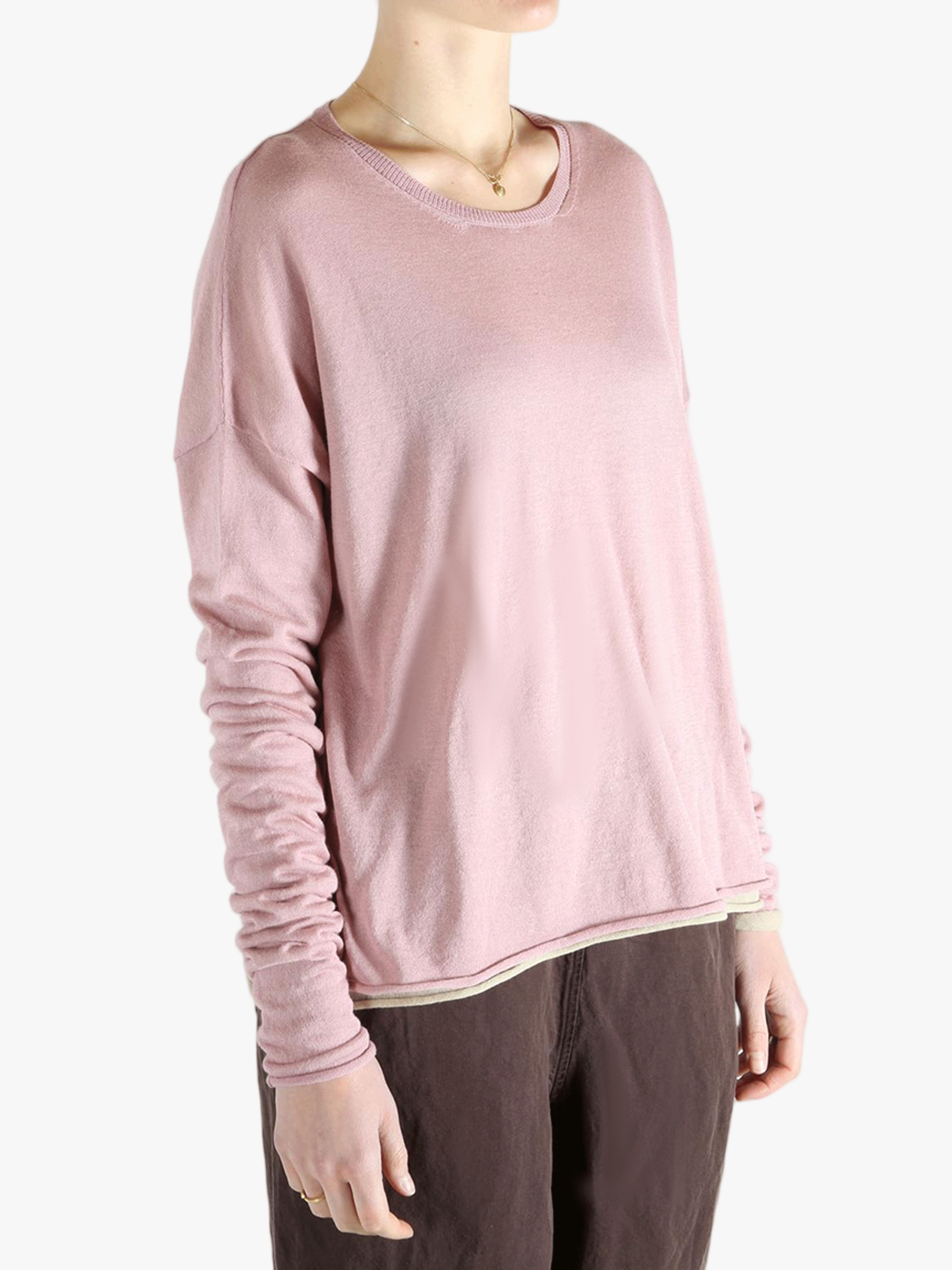 Pink top worn by a person, showing the top fit