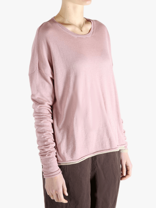 Pink top worn by a person, showing the top fit