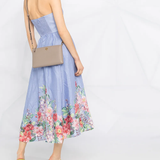 Grey bag worn by a person, showing the bag's fit