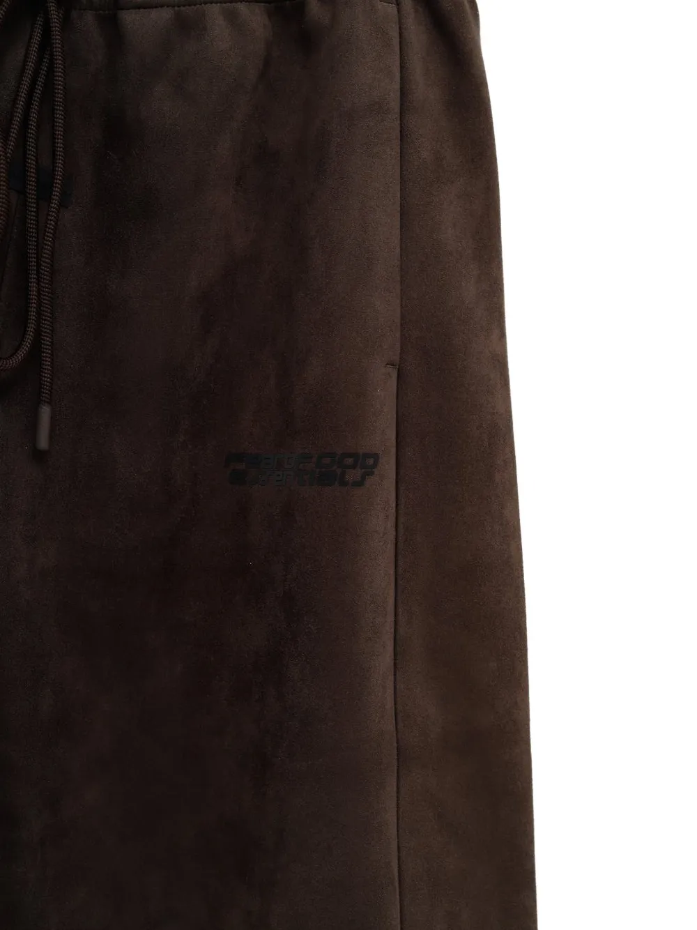 Close up of brown shorts,showing texture of the polyester fabric