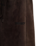 Close up of brown shorts,showing texture of the polyester fabric