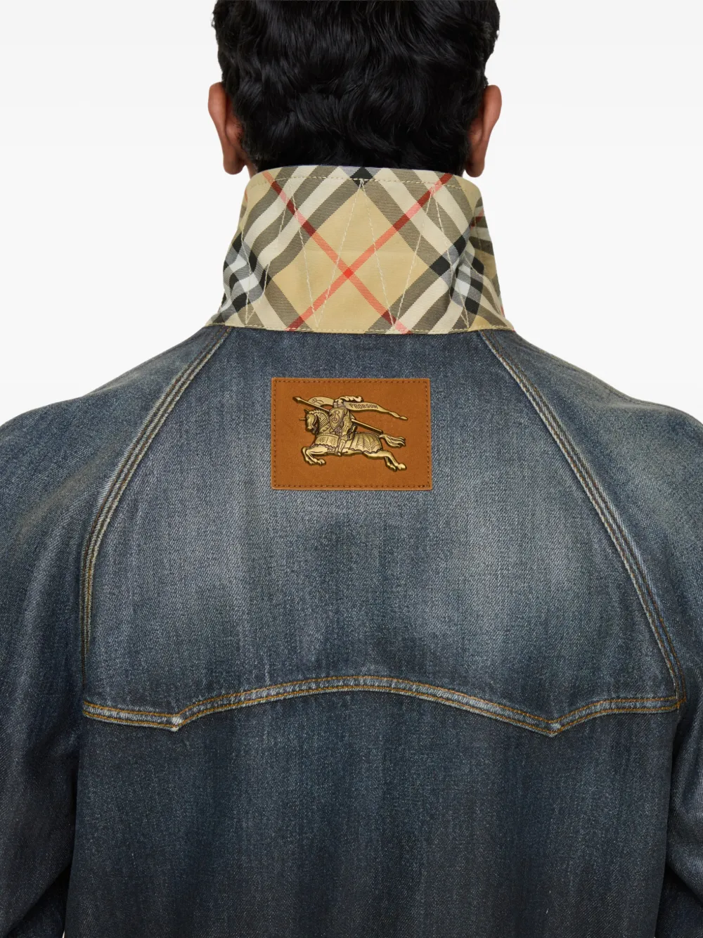 Close up of blue coats, showing texture of the cotton fabric