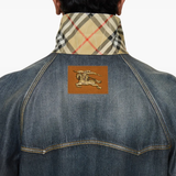 Close up of blue coats, showing texture of the cotton fabric