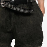 Black shorts worn by a person, showing the shorts fit