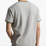 Grey t-shirt worn by a person, showing the t-shirt fit
