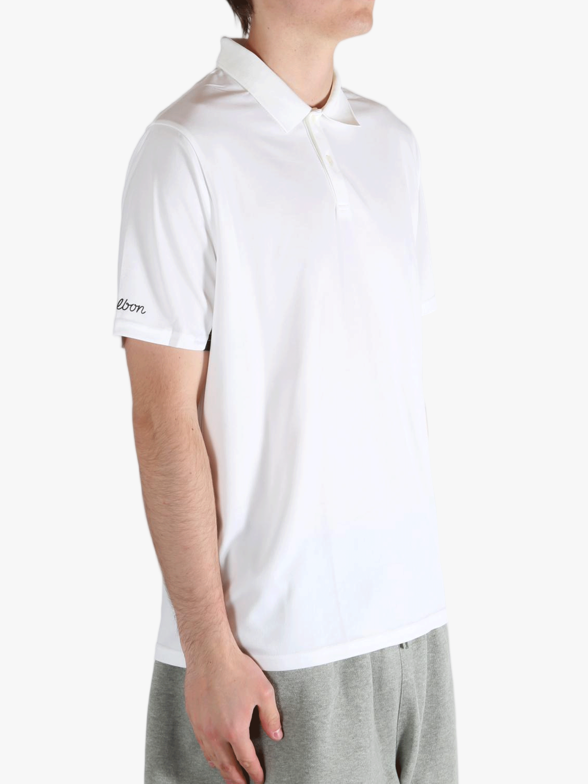 White t-shirts worn by a person, showing the t-shirts fit