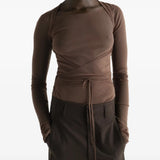 Brown top, full body view