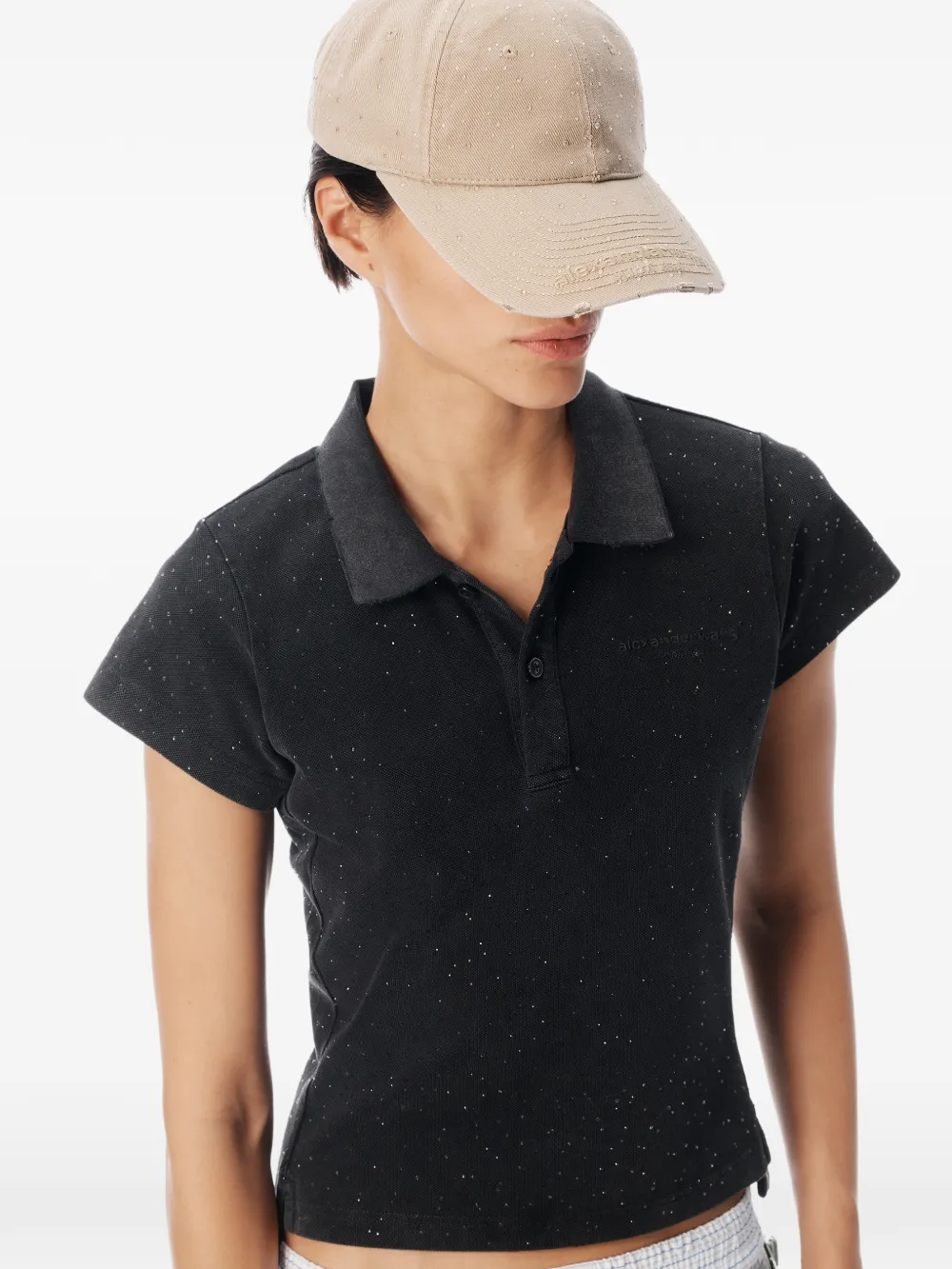 Black t-shirt worn by a person, showing the t-shirt fit