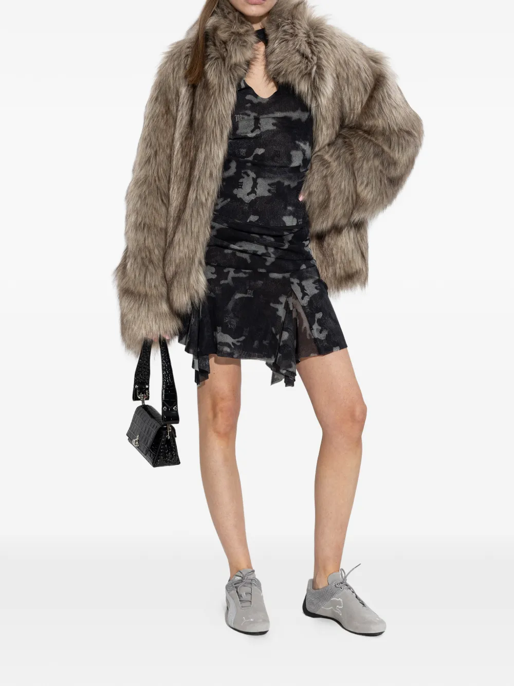 Grey sneakers, full body view