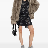 Grey sneakers, full body view