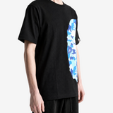 Black t-shirt worn by a person, showing the t-shirt fit