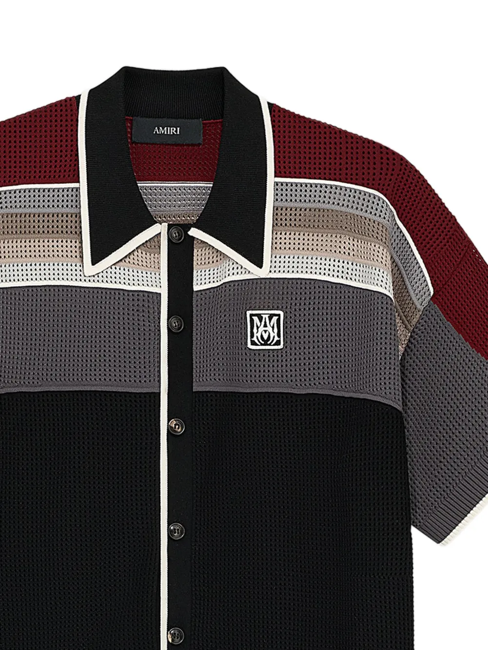 close up of black shirts, showing texture of the viscose fabric