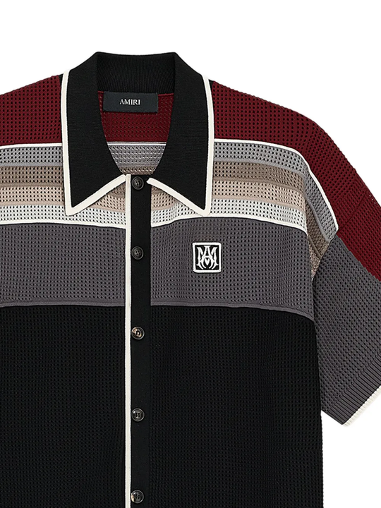 close up of black shirts, showing texture of the viscose fabric