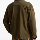 Green jacket worn by a person, showing the jacket fit