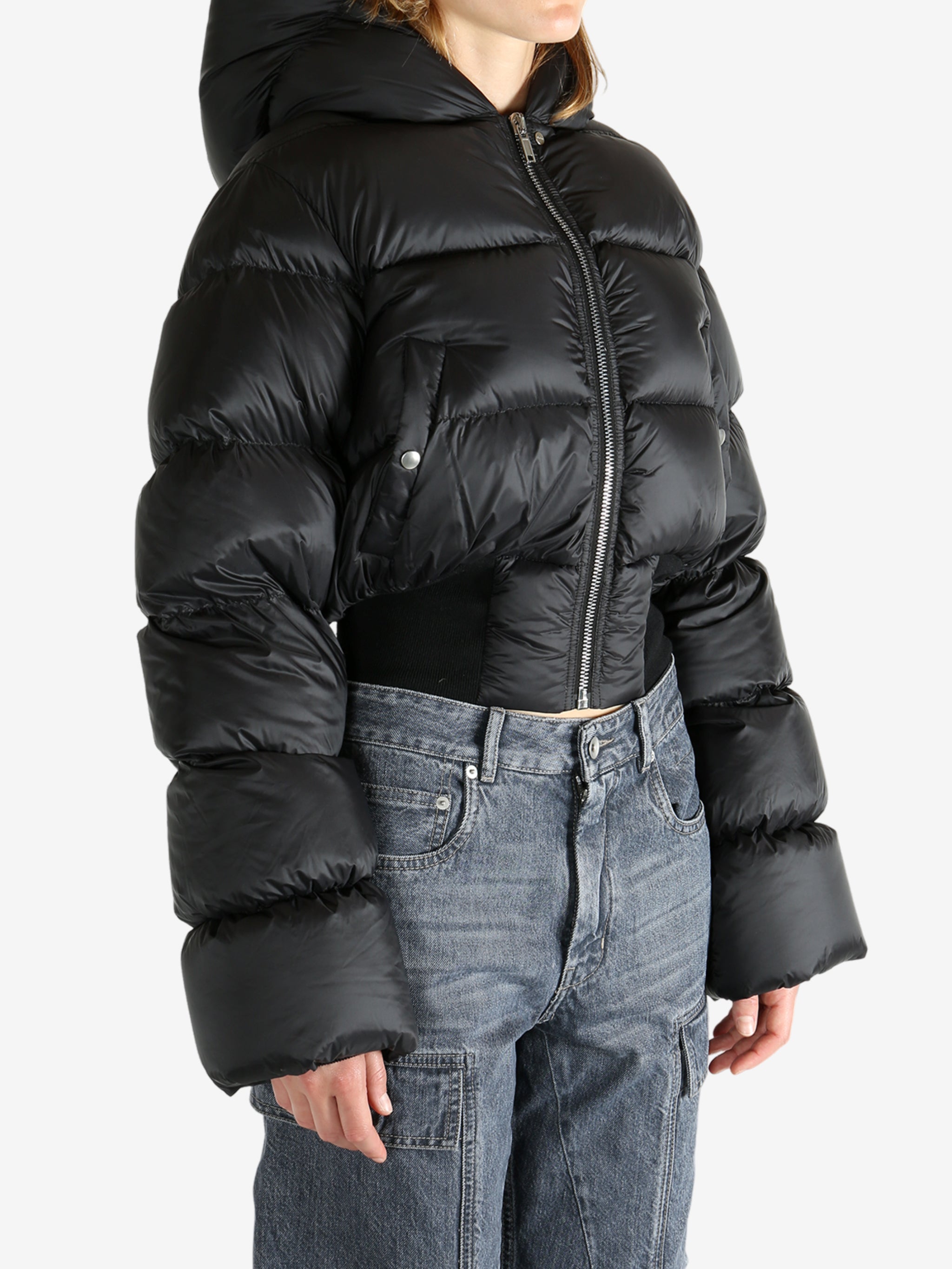 Black jacket worn by a person, showing the jacket fit