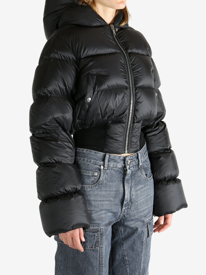 Black jacket worn by a person, showing the jacket fit