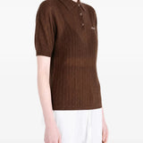Brown shirt worn by a person, showing the shirt fit