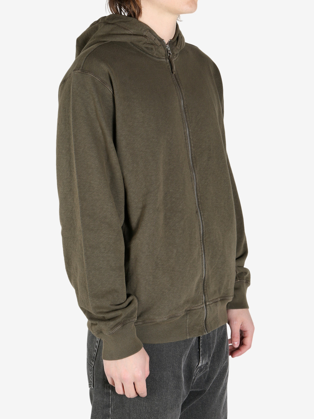 Green sweater worn by a person, showing the sweater fit