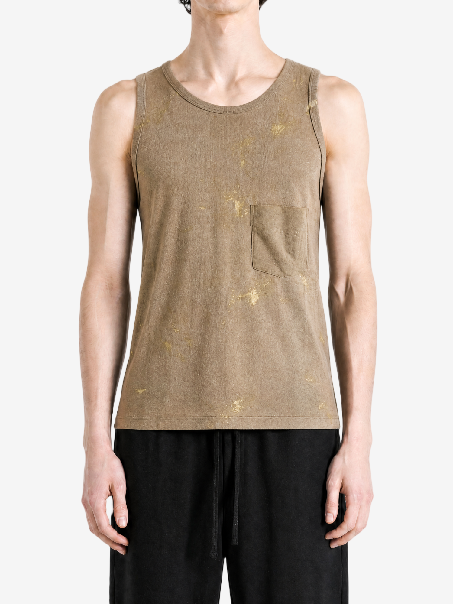 Tan top worn by a person, showing the top fit