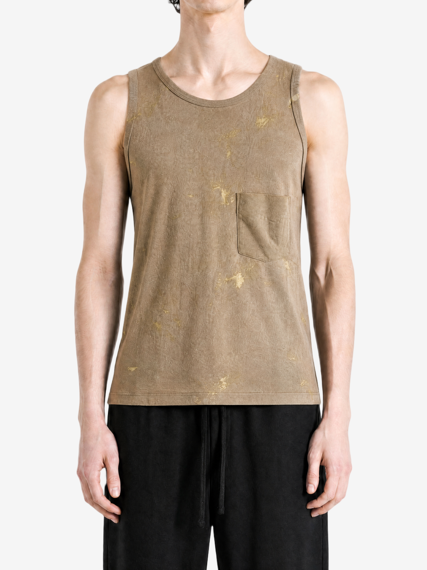 Tan top worn by a person, showing the top fit