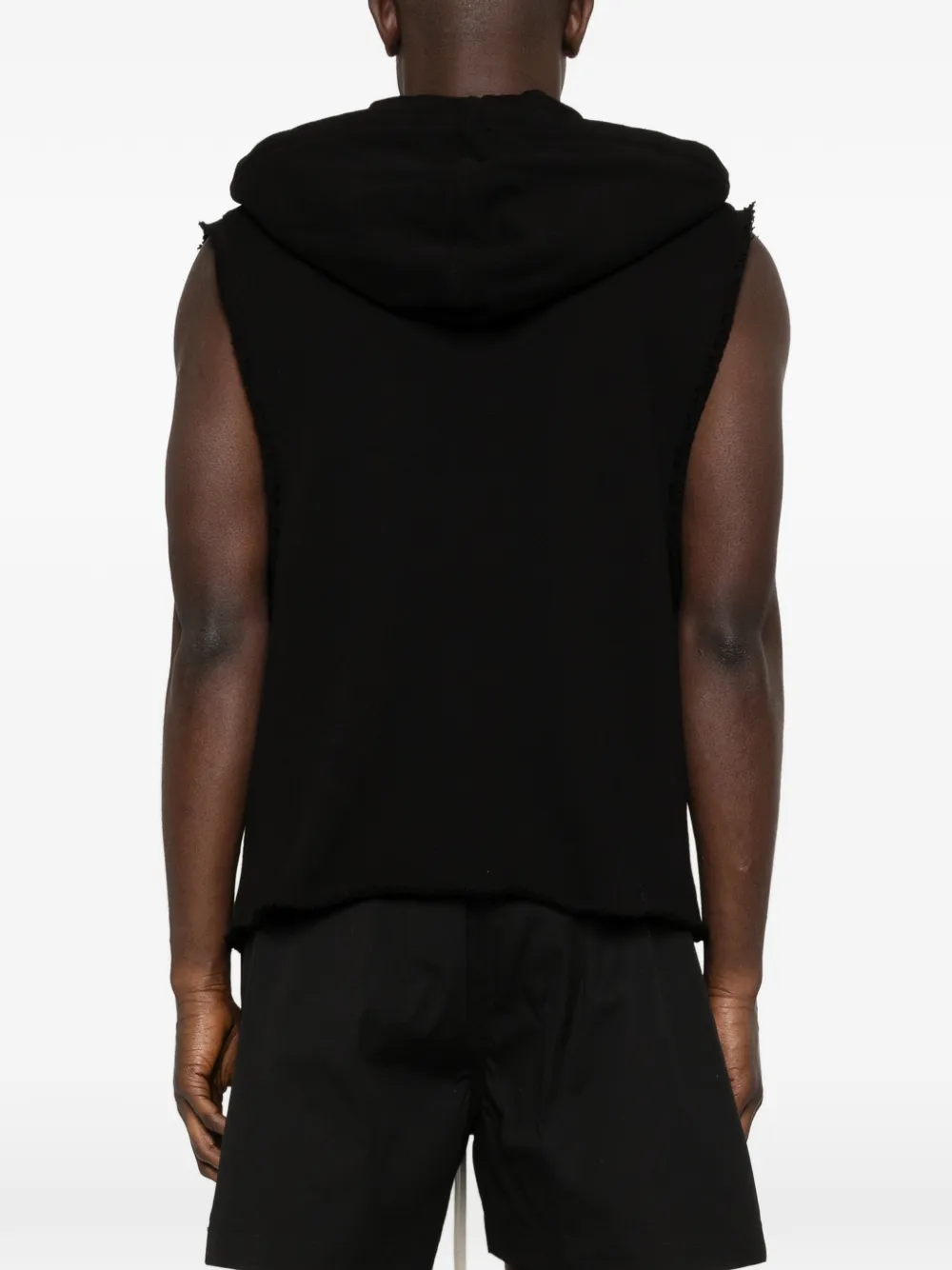 black sweats-hoodies worn by a person, showing the sweats-hoodies fit