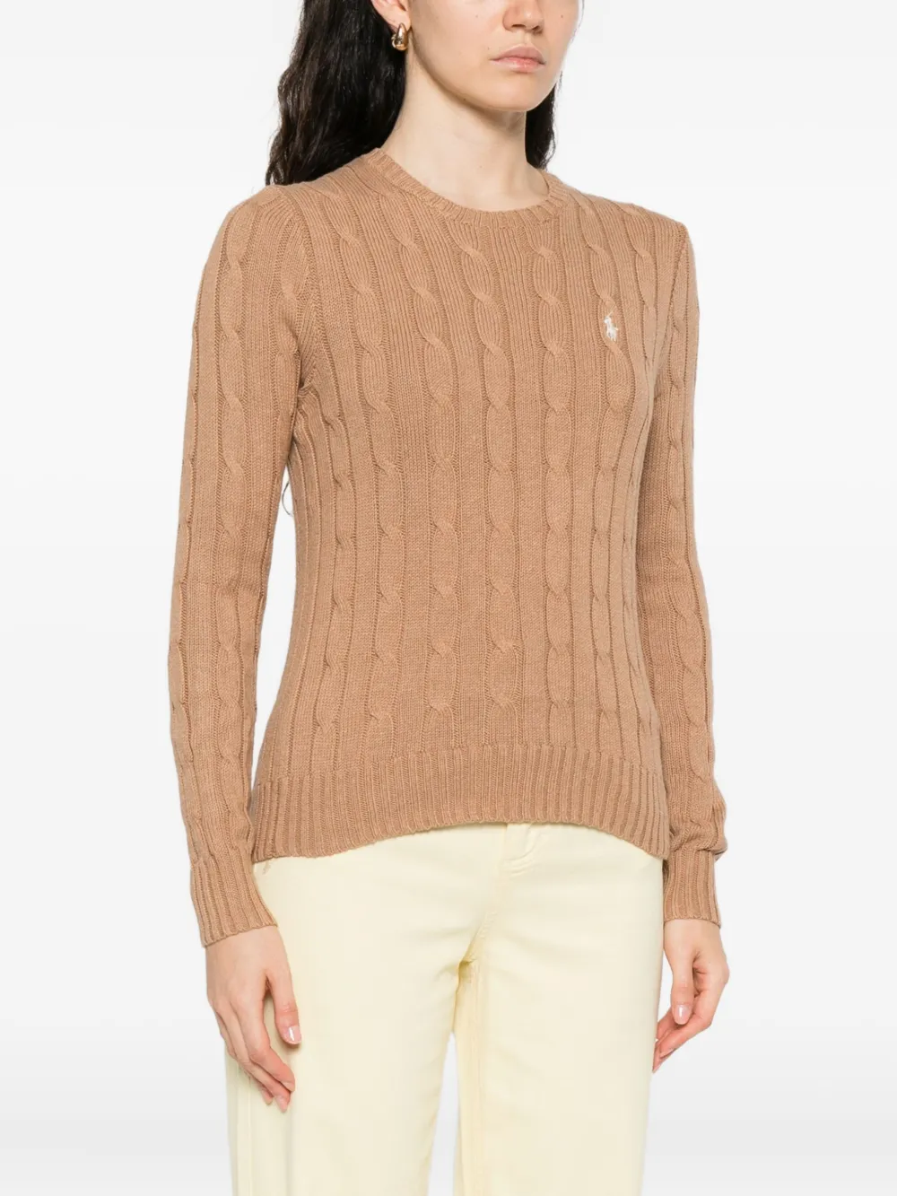 Brown sweater worn by a person, showing the sweater's fit