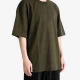 Green top, full body view