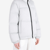 Grey jacket worn by a person, showing the jacket fit