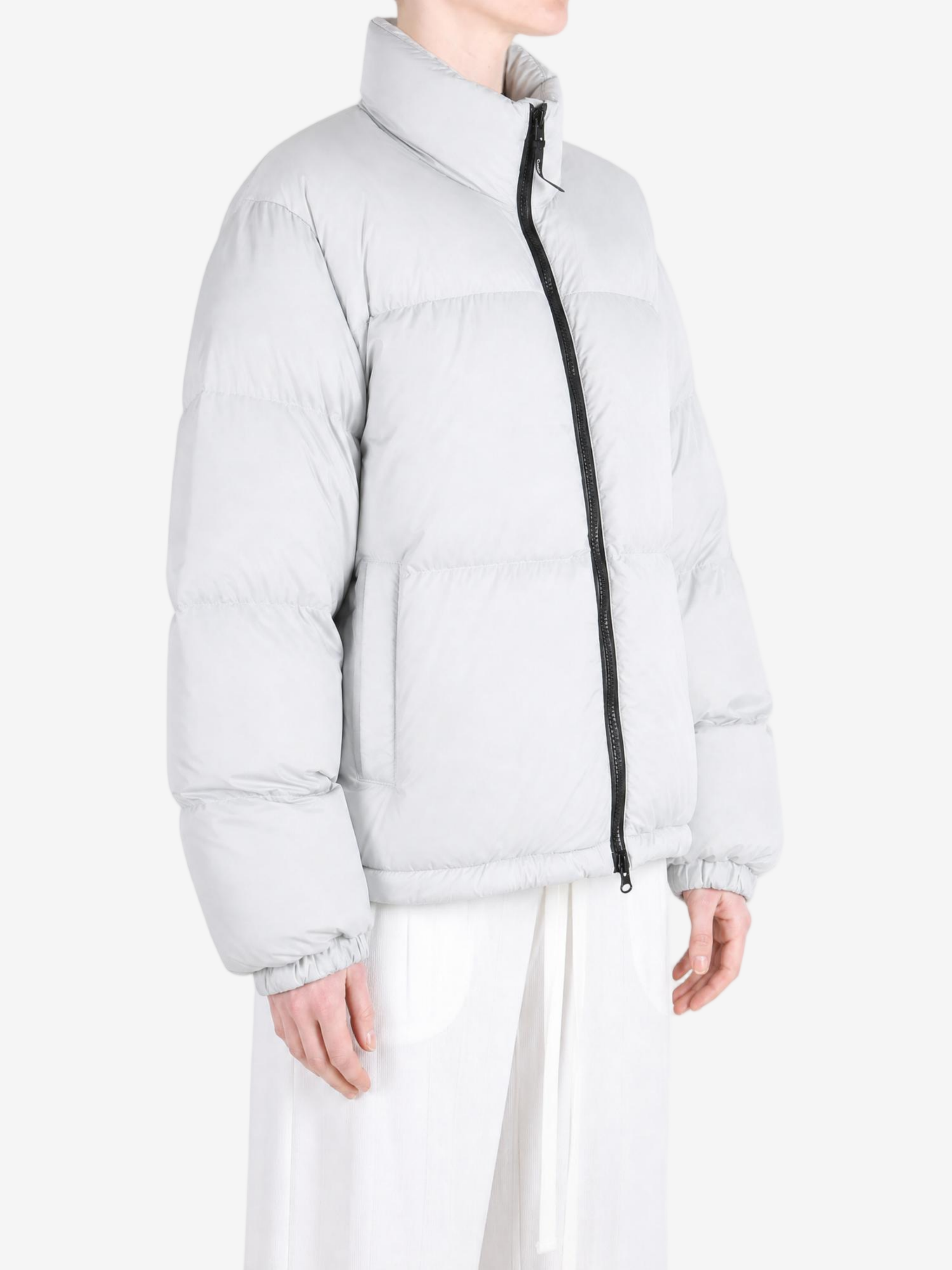 Grey jacket worn by a person, showing the jacket fit