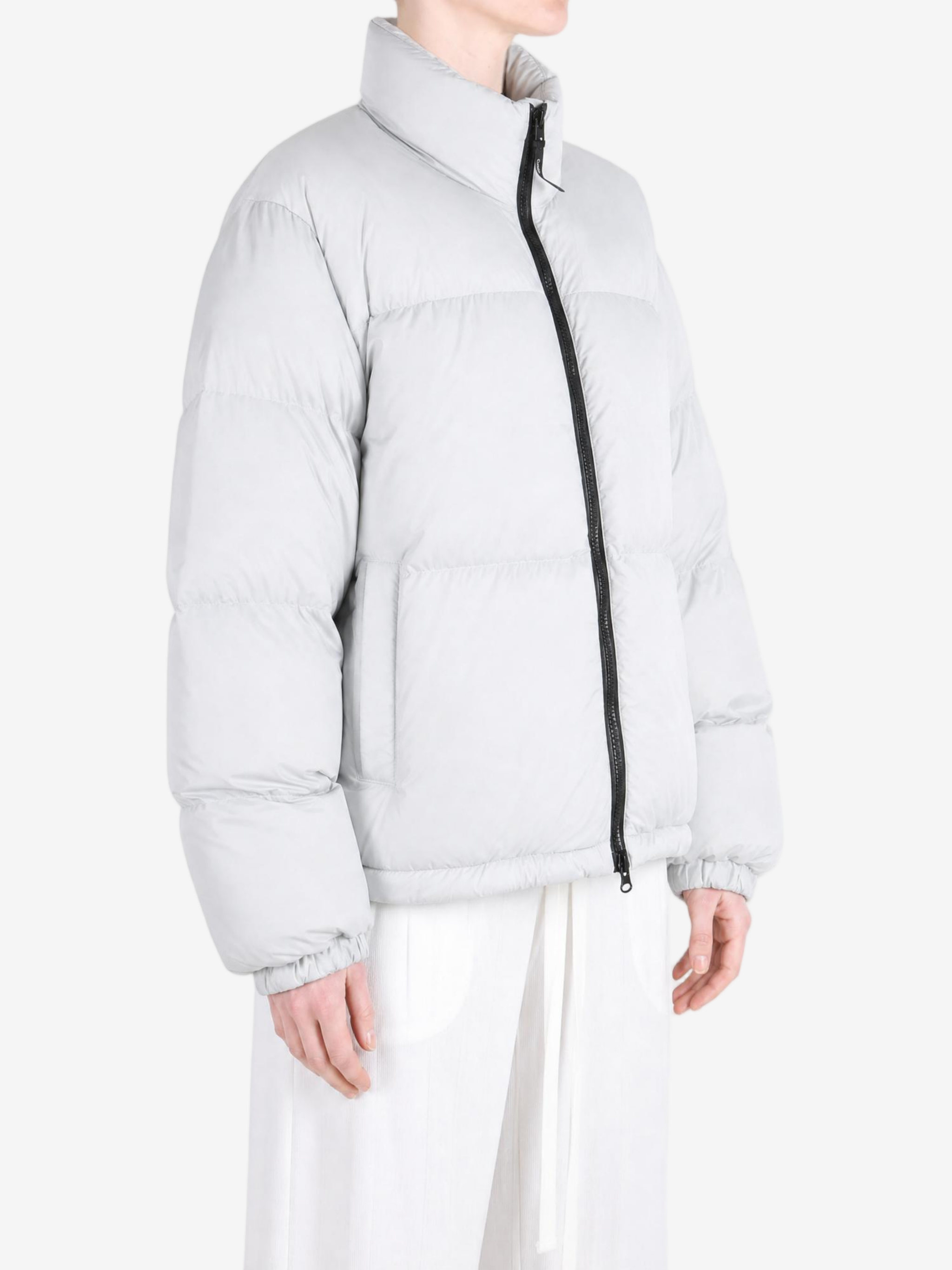 Grey jacket worn by a person, showing the jacket fit