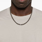 Close up of the white t-shirt, showing texture of the cotton fabric