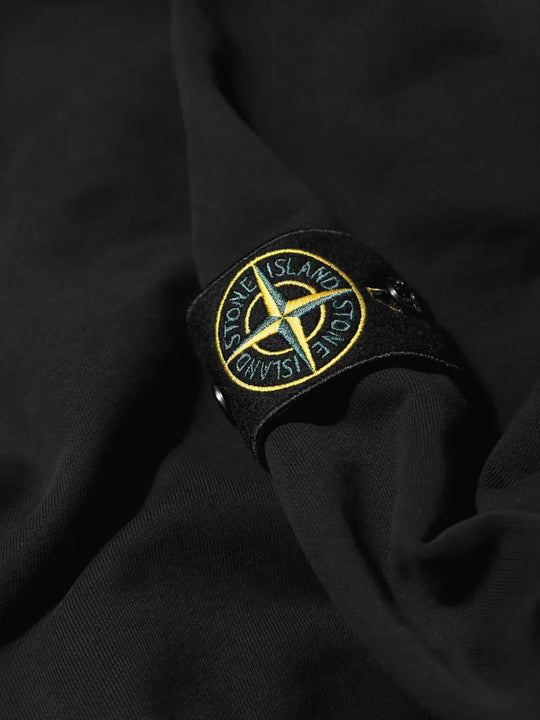 Close up of Black hoodie, showing texture of the 100% cotton fabric