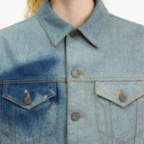 Blue jacket worn by a person, showing the jacket fit