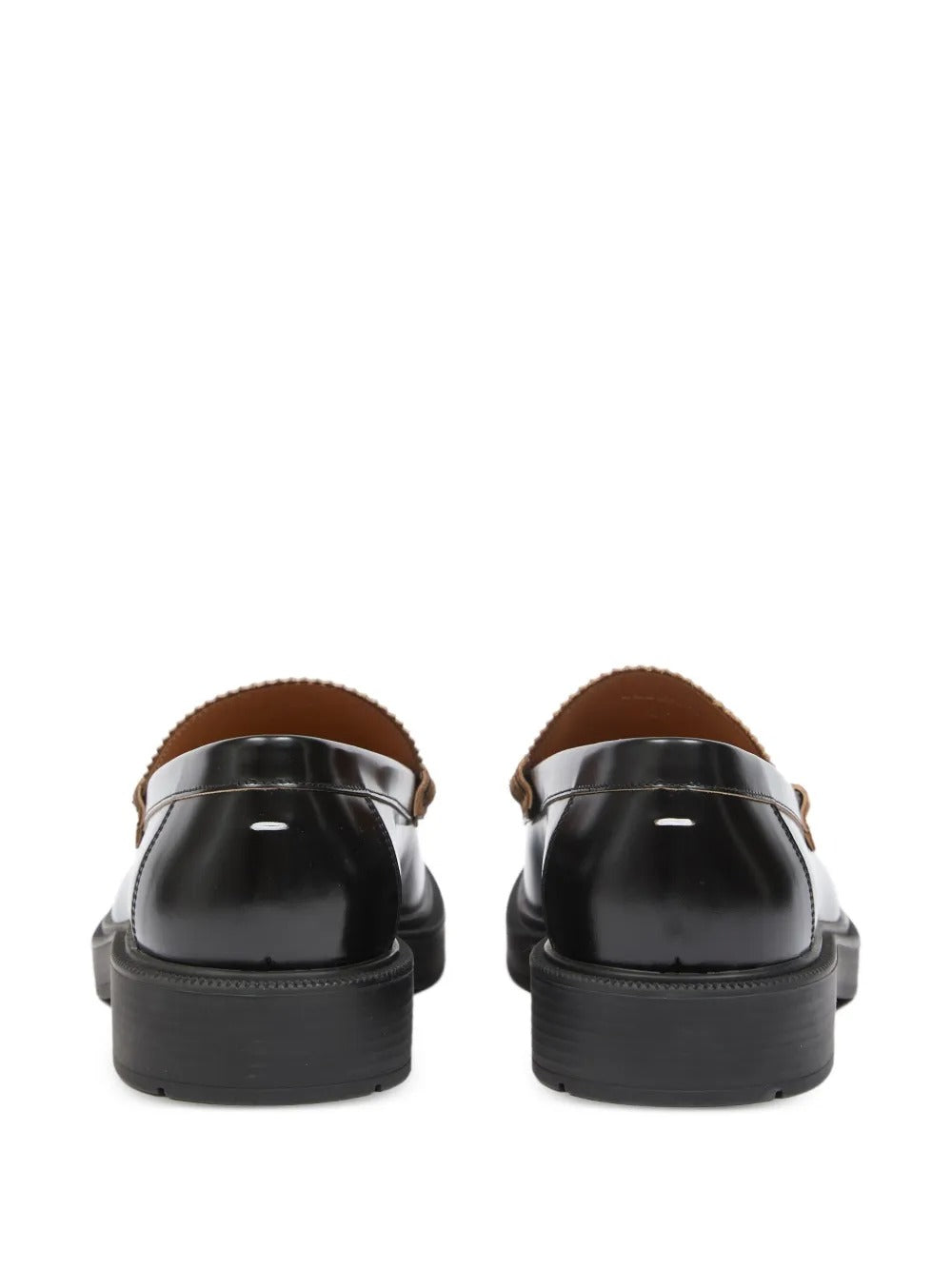 Black loafer, back view