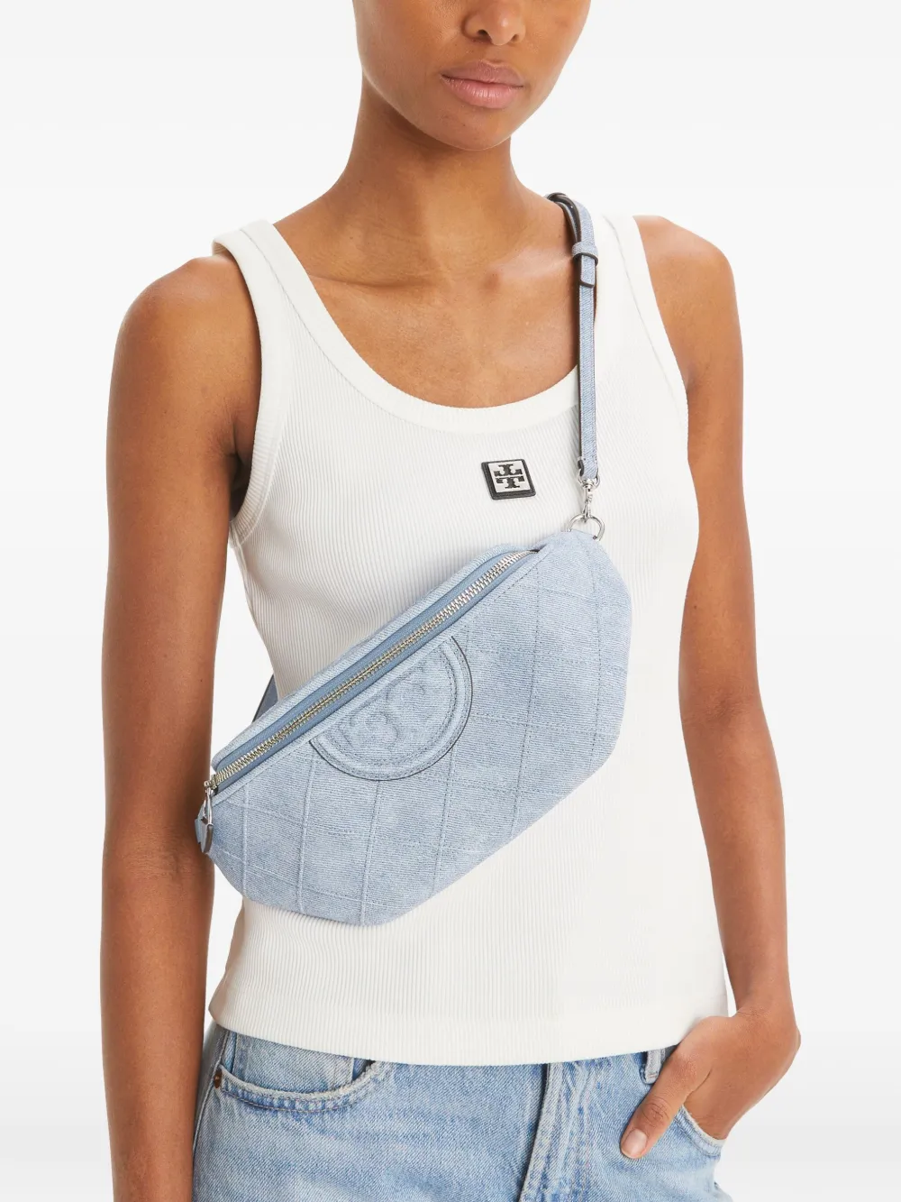 Blue bag worn by a person, showing the bag's fit