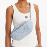 Blue bag worn by a person, showing the bag's fit