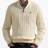 Creme sweater worn by a person, showing the sweater's fit