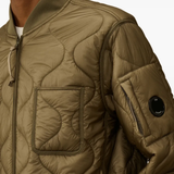 Close up of brown top,showing texture of the cotton fabric.