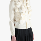 White jacket worn by a person, showing the jacket's fit