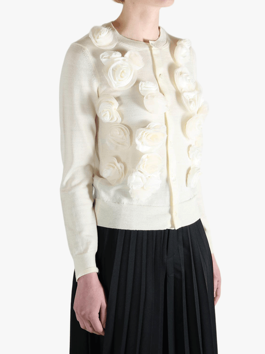 White jacket worn by a person, showing the jacket's fit