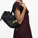 Black bag worn by a person, showing the bag fit