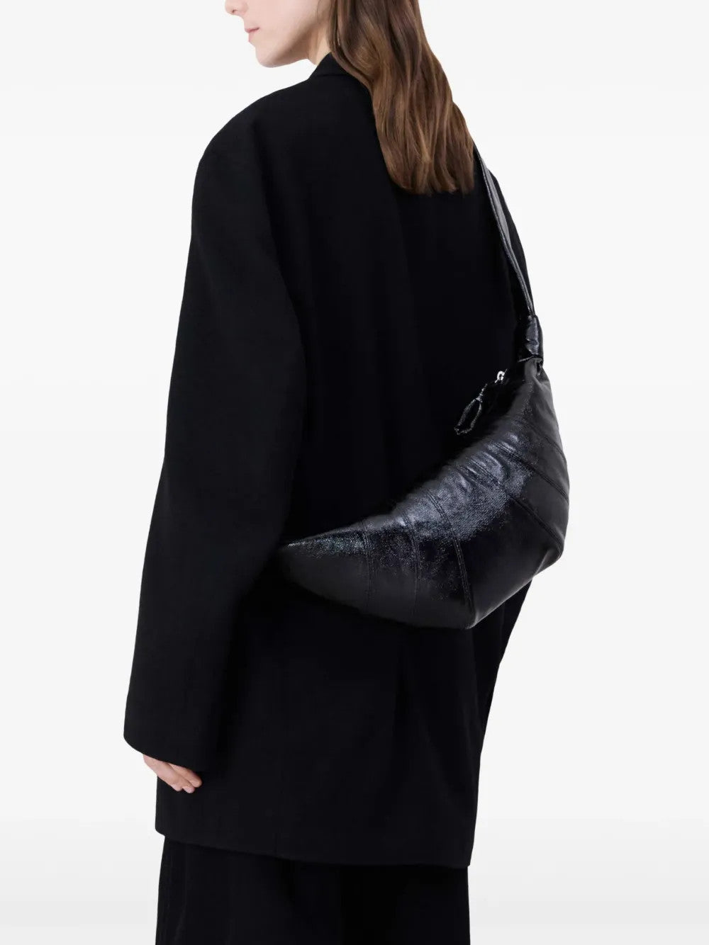 Black bag worn by a person, showing the bag fit