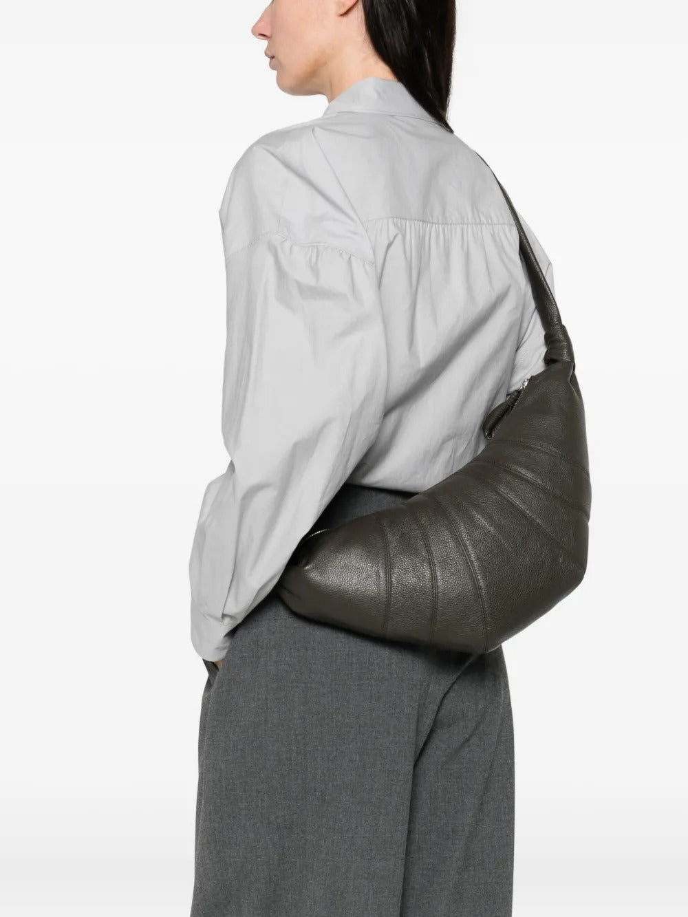 Grey bag worn by a person, showing the bag's fit