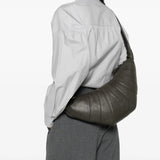 Grey bag worn by a person, showing the bag's fit