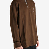 Brown shirt worn by a person, showing the shirt's fit