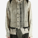 Green gilet worn by a person, showing the gilet's fit